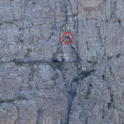 Climbers at base of the first<br />abseil.